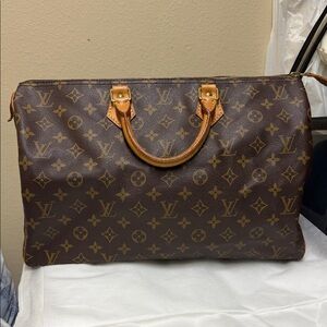 Louis Vuitton Men's Bag in Brown Monogram Canvas